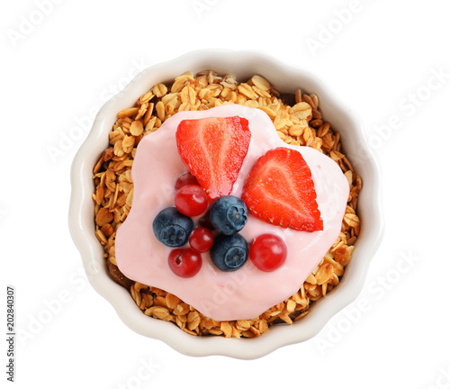Bowl with yogurt, berries and granola on white background, top view