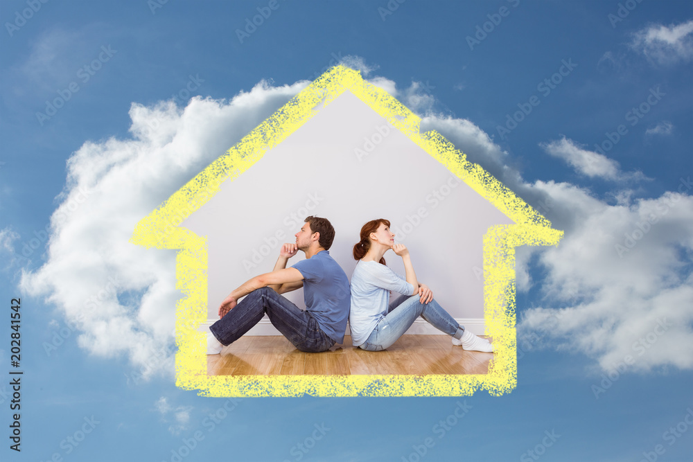 Couple sitting on floor together against cloudy sky