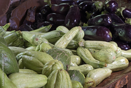 Open air market stall with vegetables photo