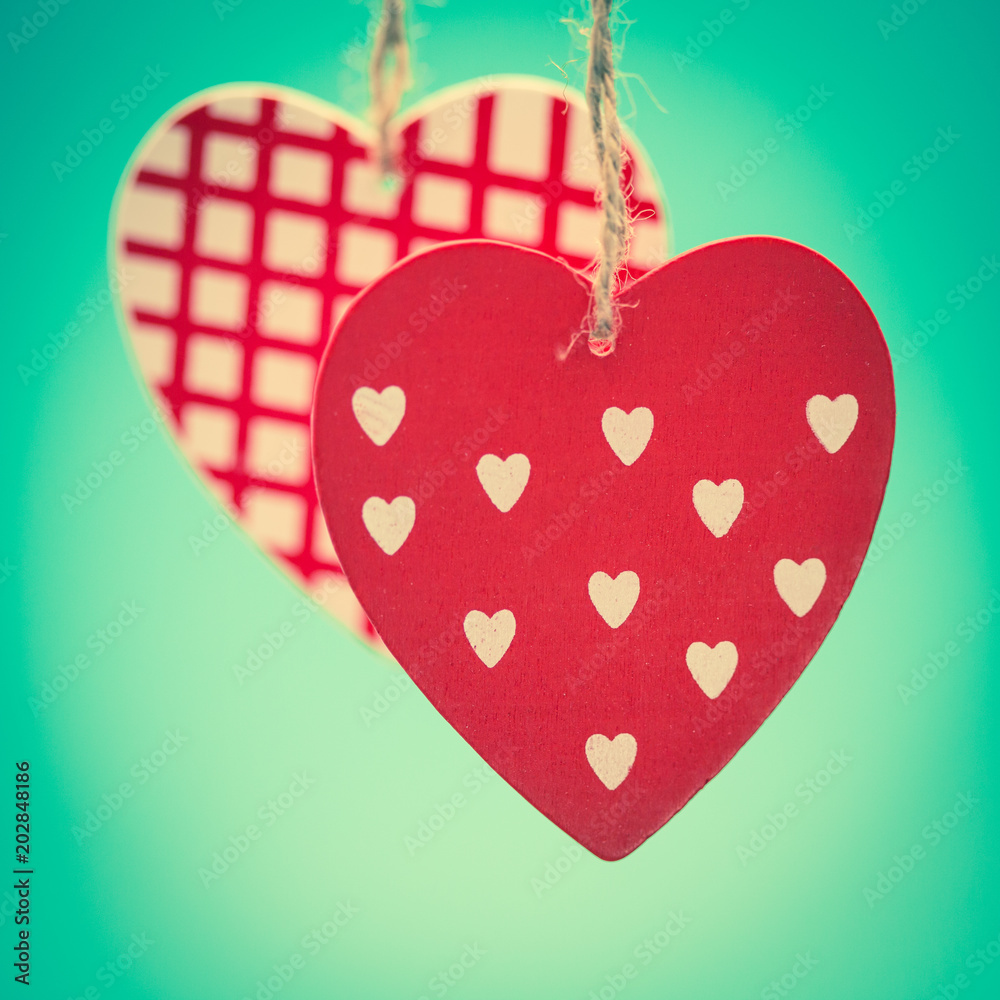 Fotografie Two hanging heart ornaments