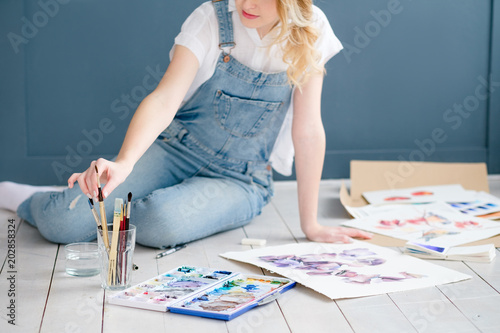 art painting hobby. creative leisure. girl drawing a picture. talent inspiration creation and self expression concept photo