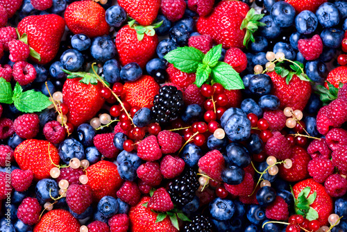 strawberries  blueberries  raspberries and black berries. fresh berries on white background