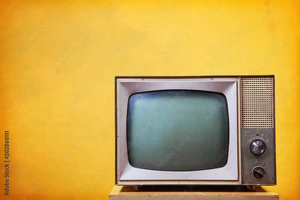 Vintage Television on a yellow background