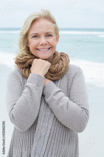 Portrait of a smiling senior woman at beach