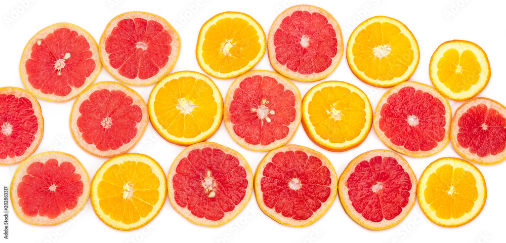 Round slices of the red grapefruits and oranges Round slices of the red grapefruits and oranges