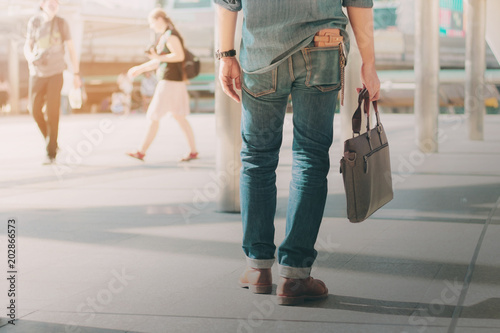 man walking in city.