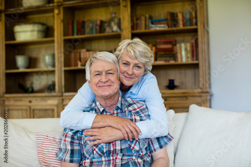 Portrait of senior couple embracing each other