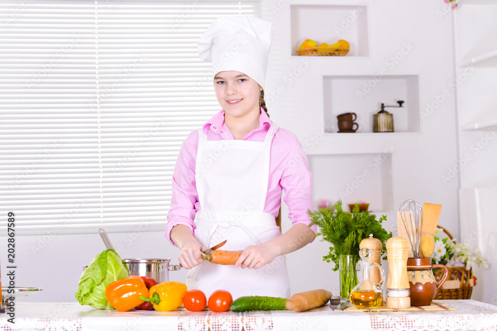 beautiful girl wearing chef uniform cooking beautiful girl wearing chef uniform cooking