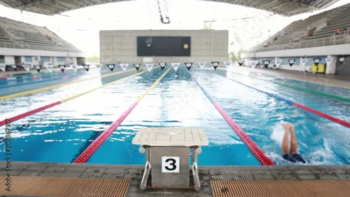 Swimmer practice in swimming pool