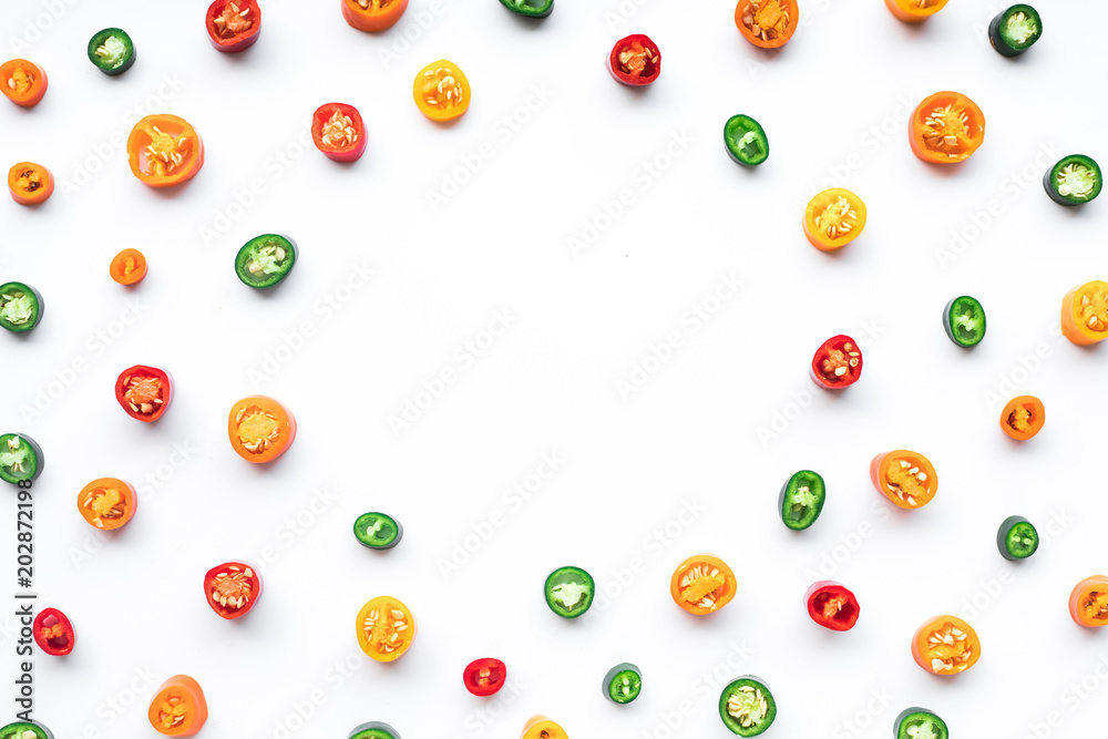 Top view of chilli set with copy space on pastel color background.flat lay design Top view of chilli set with copy space on pastel color background.flat lay design