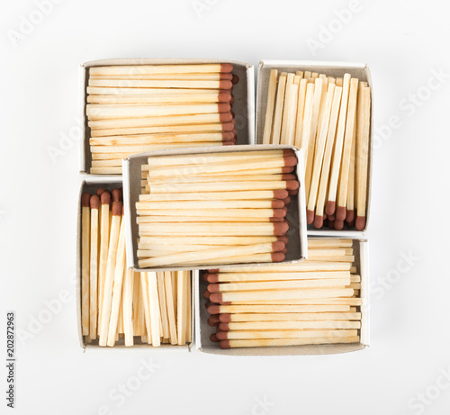 Opened Matchboxes with Brown Matches
