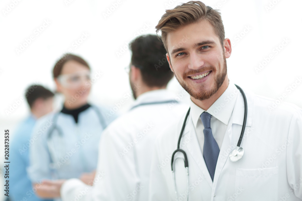 Portrait of friendly male doctor smiling Portrait of friendly male doctor smiling