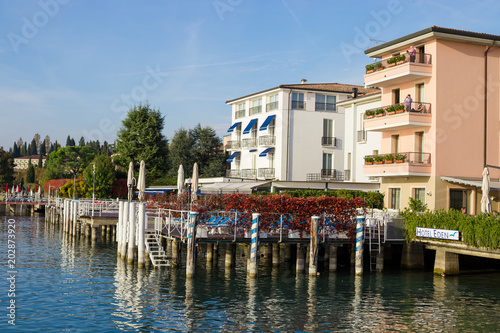 Tourists relaxing in Hotel on the Lake Garda in Sirmione, Italy.
