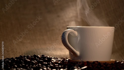 coffe cup with roasted beans photo