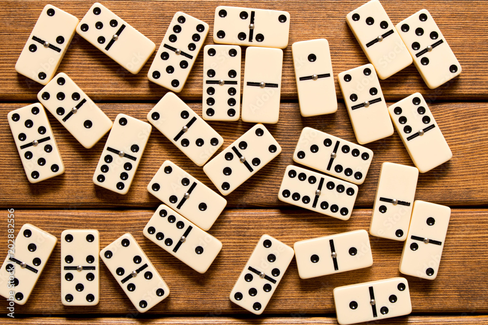 Domino game on wooden background . Top view Domino game on wooden background . Top view