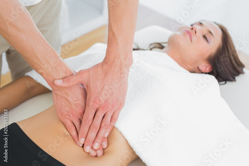 Closeup of a physiotherapist massaging womans body