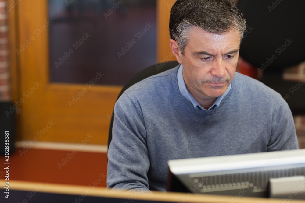 Man working on a computer Man working on a computer
