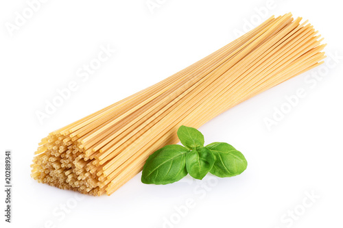 Spaghetti and basil isolated on white background. Raw.