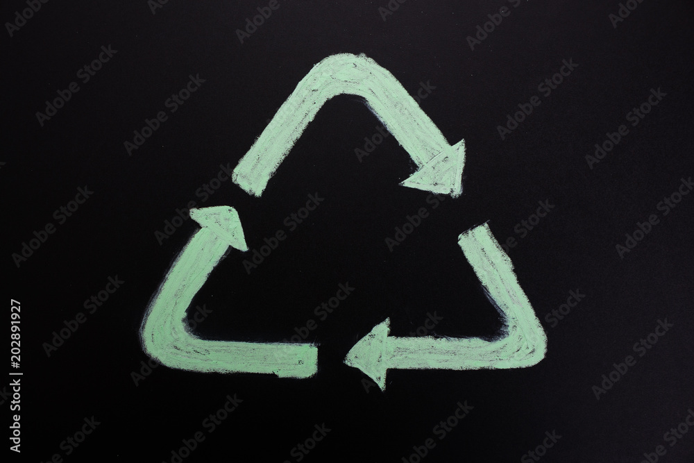Used batteries on a dark background, the concept of recycling Used batteries on a dark background, the concept of recycling