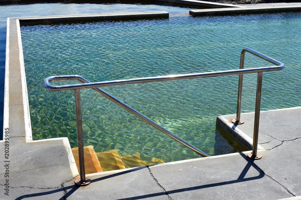 Swimming pool access stairs