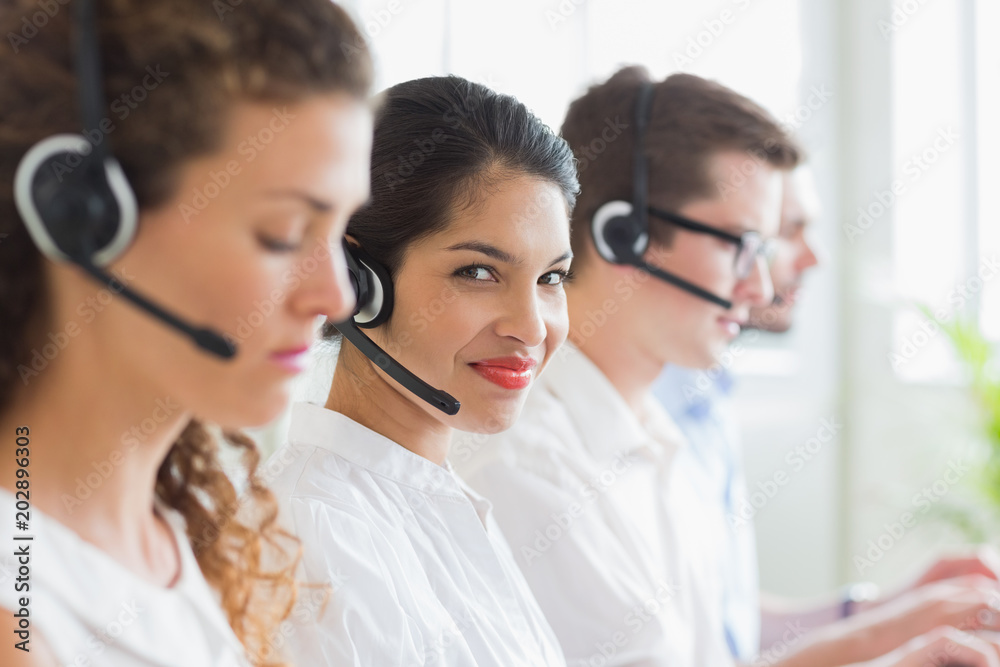 Businesswoman working in call center Businesswoman working in call center