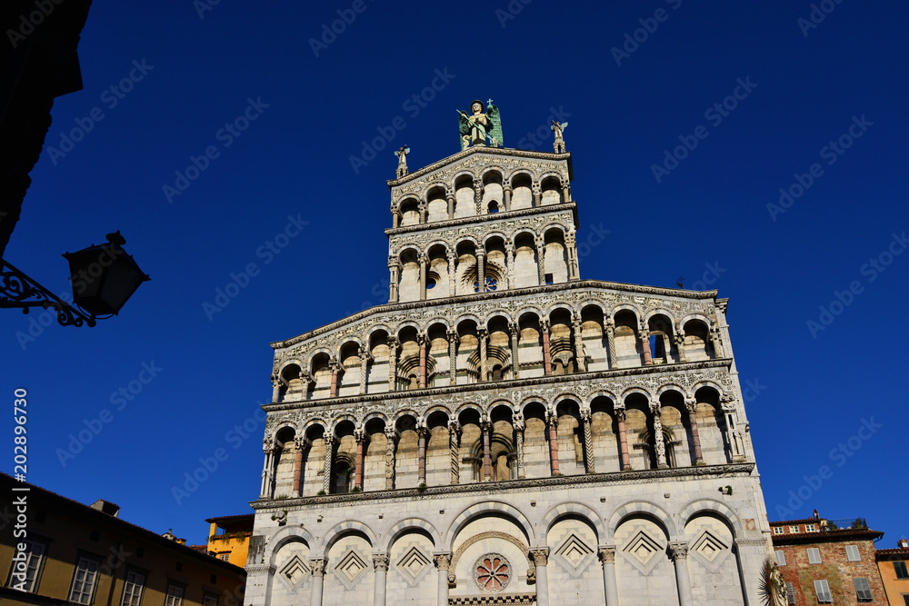 Saint Micheal in Foro Church beautiful medieval romanesque facade in the city of Lucca, Tuscany, erected in the 13th century