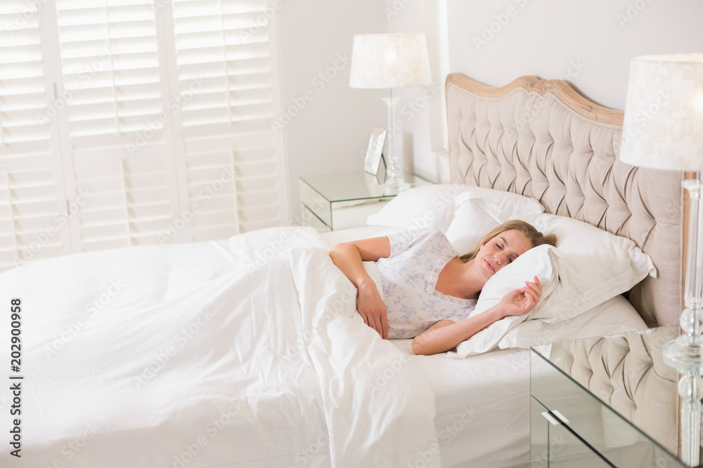 Natural calm woman resting in bed Natural calm woman resting in bed