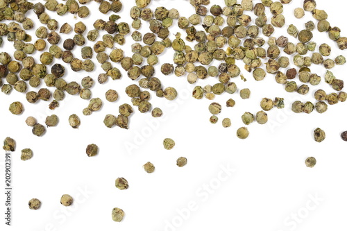 Dry green pepper pile, peppercorn isolated on white, top view
