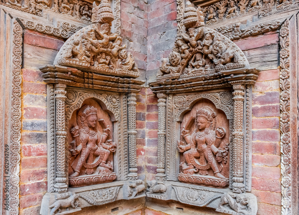 Carved statues on Mul Chowk courtyard wall, Hanuman Dhoka Royal Palace, Patan Durbar Square, Lalitpur, Nepal