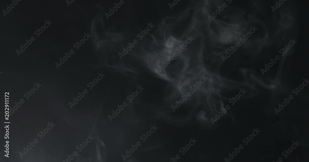 vapor steam rising over black background