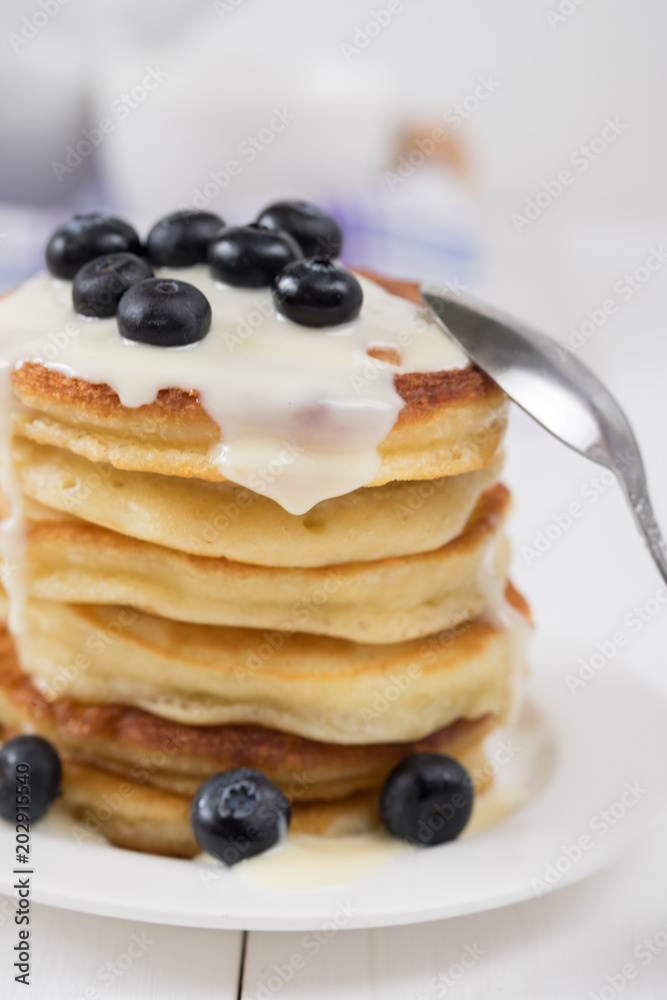 Blueberry pancakes and berries Blueberry pancakes and berries