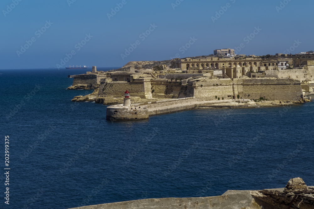 Valletta, Malta Fort Rikasoli bastioned fort day view. Large 17th century fort at the entrance of the Grand Harbour in the capital of Malta.