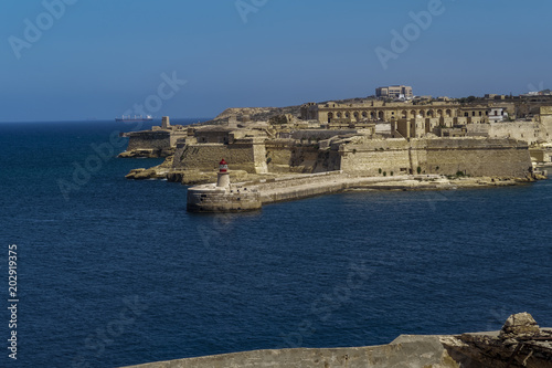 Fototapeta Naklejka Na Ścianę i Meble -  Valletta, Malta Fort Rikasoli bastioned fort day view. Large 17th century fort at the entrance of the Grand Harbour in the capital of Malta.