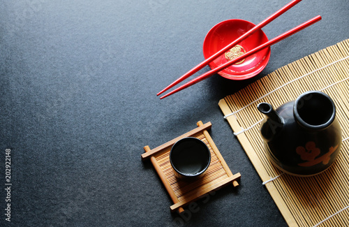 japanese sake and chopsticks oriental drink style on the table