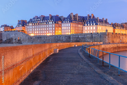 Night view of famous walled port city of Privateers Saint-Malo is known as city corsaire, Brittany, France
