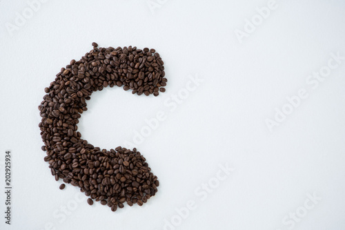 Coffee beans forming alphabet C