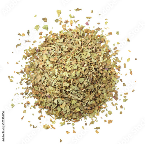 dried crushed basil leaves isolated on white, top view