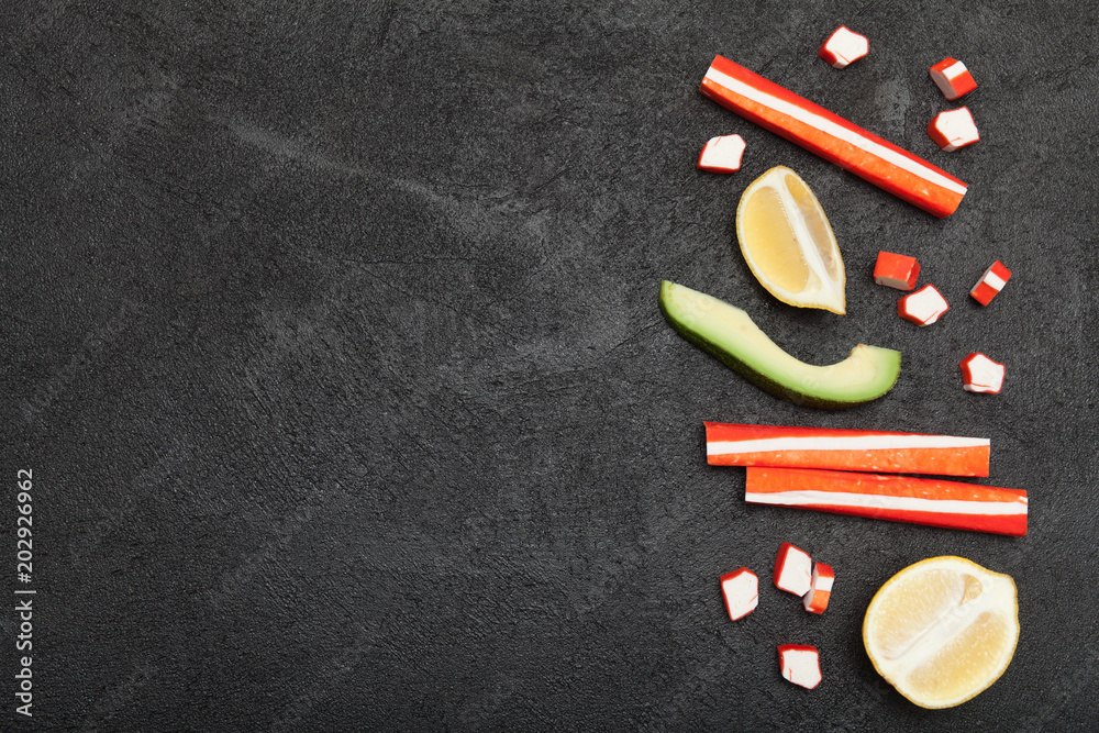 Asian snack surimi, artificial substitute for crab meat. Copy space for text. Asian snack surimi, artificial substitute for crab meat. Copy space for text.