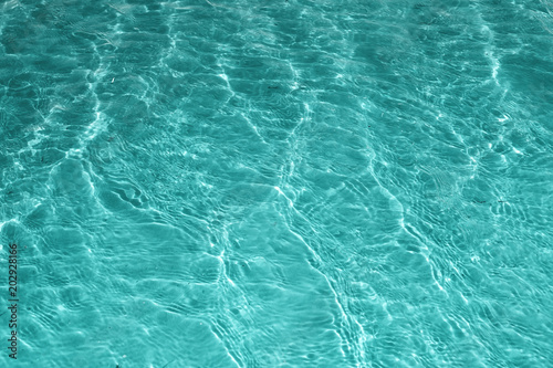 Water in swimming pool rippled water detail background © martina87
