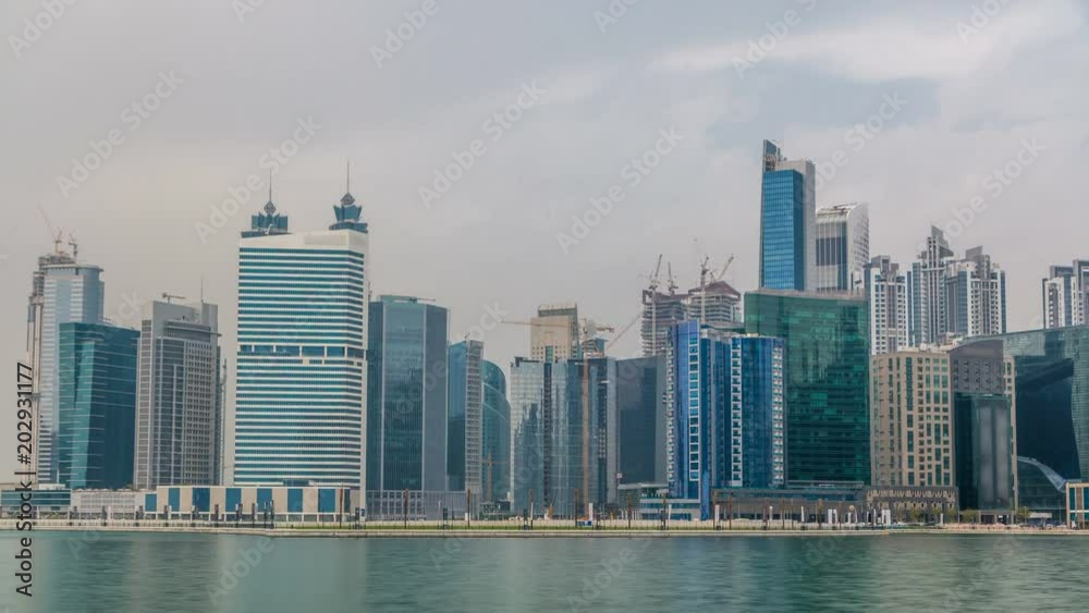 Panoramic timelapse view of business bay and downtown area of Dubai reflection in a river. Panoramic timelapse view of business bay and downtown area of Dubai reflection in a river.