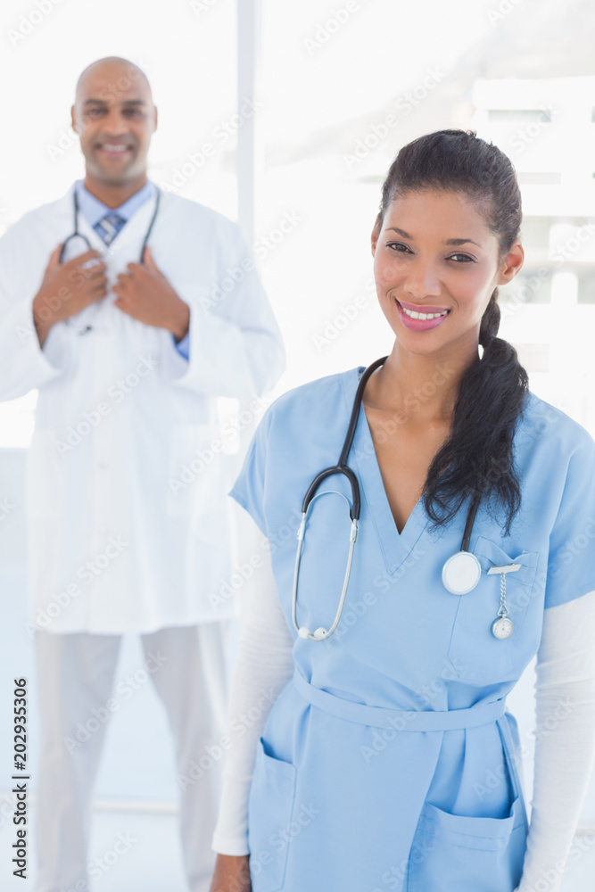 Fototapeta premium Smiling doctors looking at camera