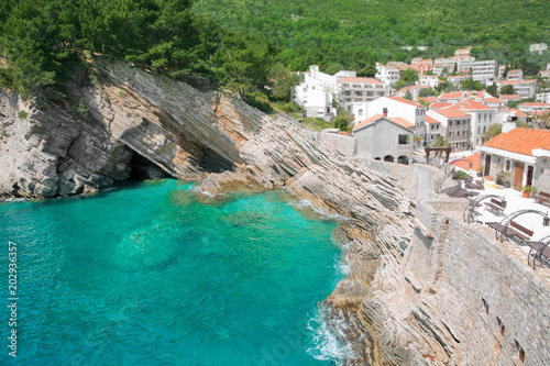 Cliff in Petrovac, Montenegro. Turquoise water adriatic sea. Beautiful mediterranean landscape.