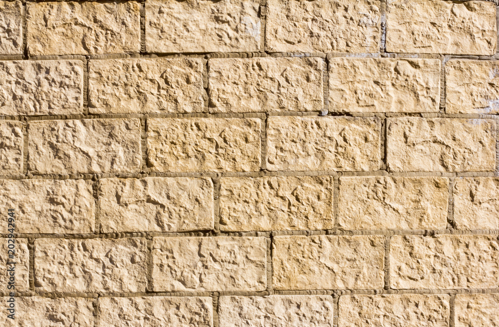 stone Foundation, the texture of decorative stone, painted in yellow stone Foundation, the texture of decorative stone, painted in yellow