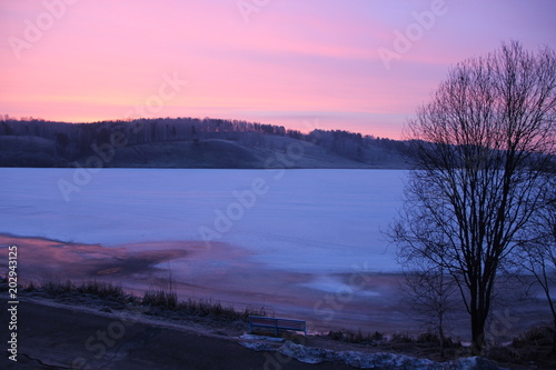 View from the window on ice covered lake