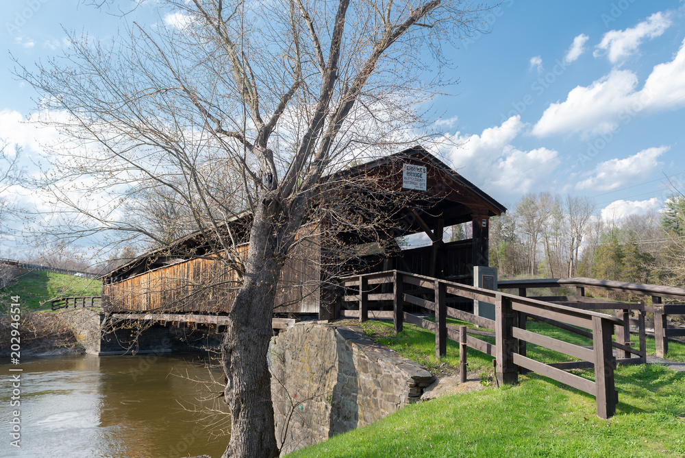 Perrine's Bridge is the second oldest covered bridge in the State of New York. This Burr Arch Truss Bridge crosses the Wallkill River in the Town of Esopus-Rosendale near Rifton, NY. 