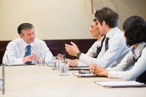 Smiling business people having a meeting