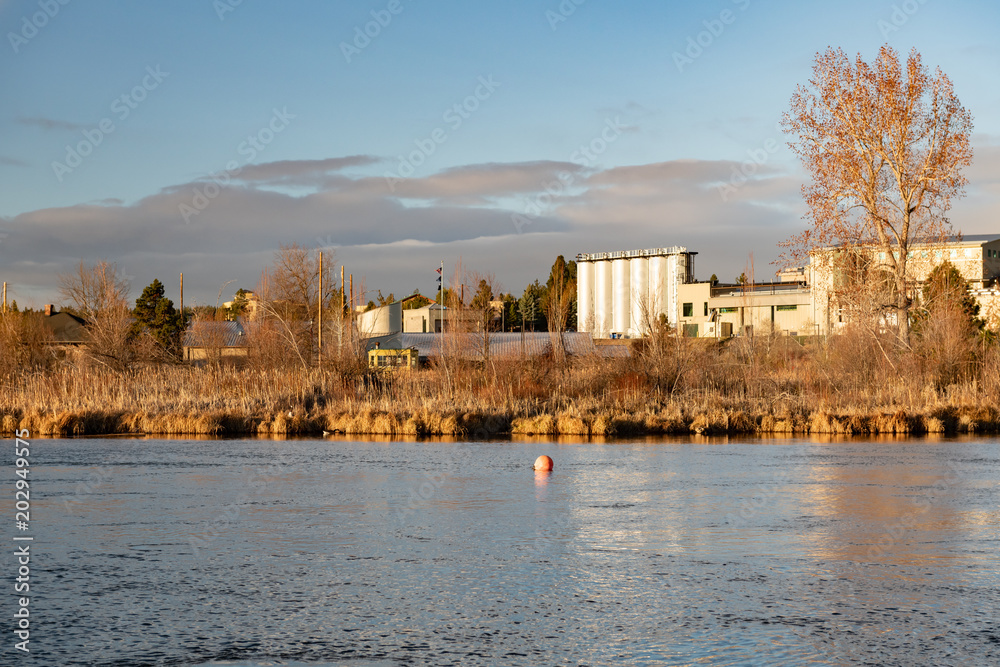 View of a brewery along the Deschutes River in Bend, Oregon early morning