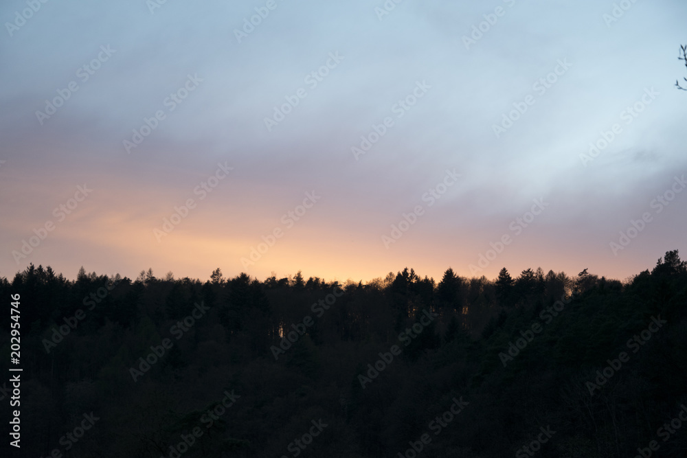 sunset over the forest spessart