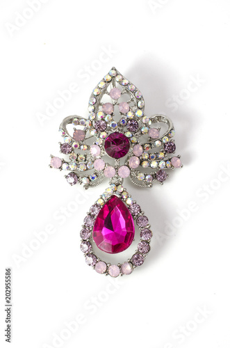 Brooch with pink diamonds isolated on white