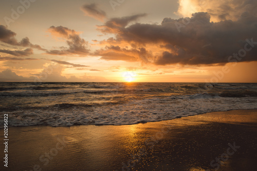 Fototapeta Naklejka Na Ścianę i Meble -  Sunset. Beautiful sunset at baltic sea. Gold sea sunset.